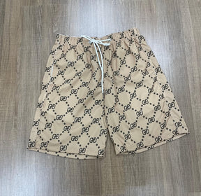 Conjunto da Gucci ( Coleção nova) [CAMISA + BERMUDA + CHINELO]